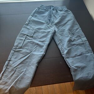 Gray blue cargo pants with drawstring and pockets cotton poly blend runs small